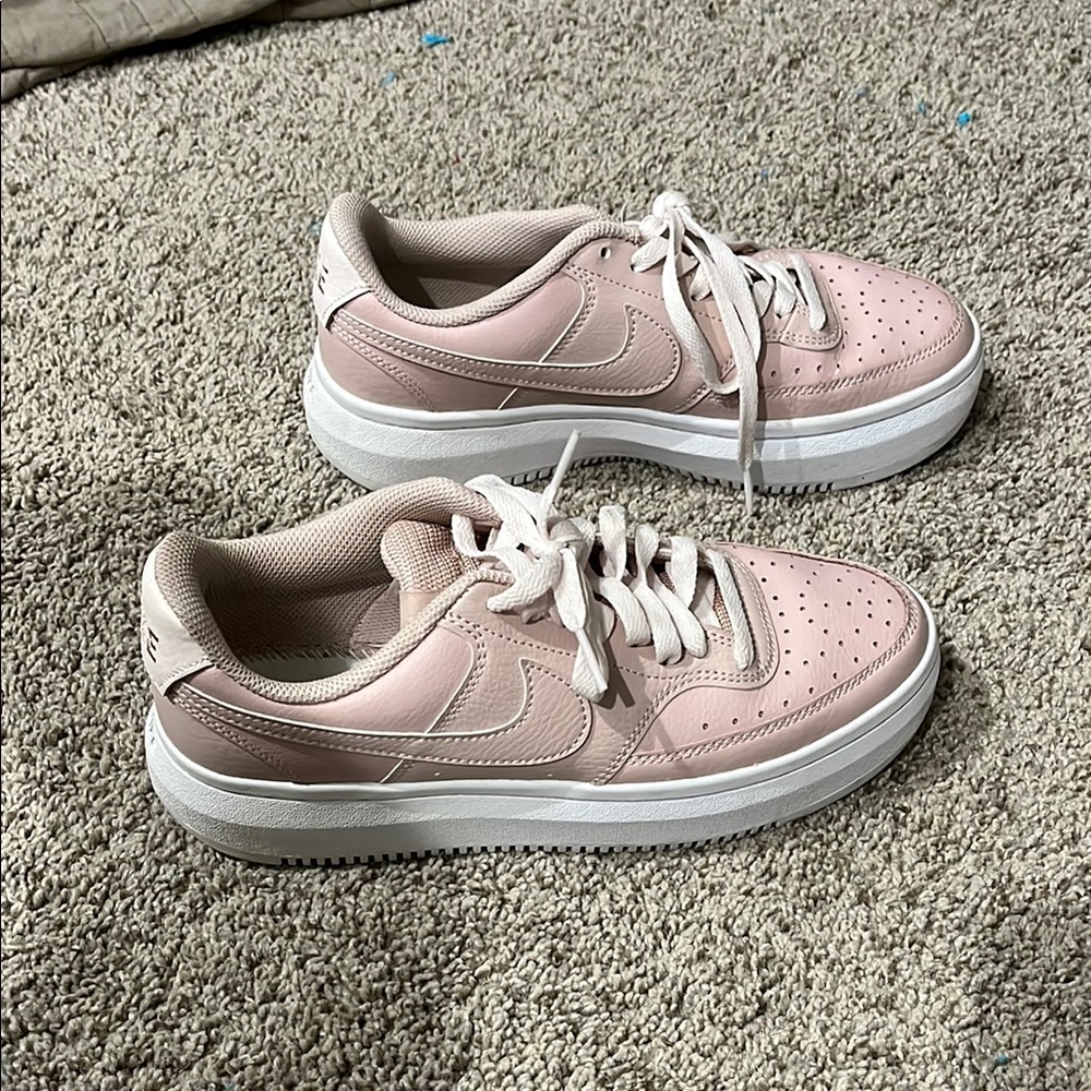 Nike Pink and White Casual Sneakers with Minimalist Design